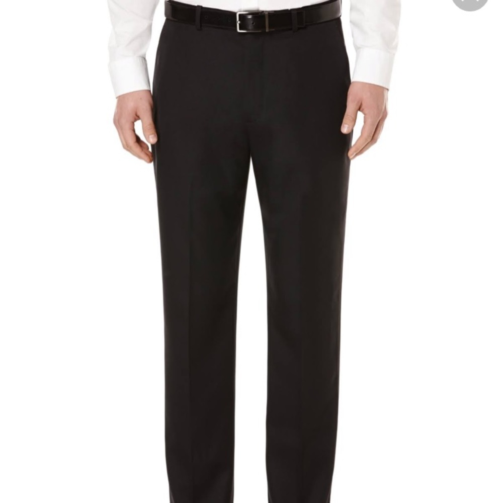 Two pairs of Perry Ellis city fit dress pants.